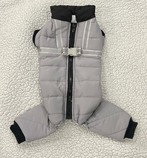 grey and black four legged waterproof onesie with black zipper design on the back and silver reflective built-in harness